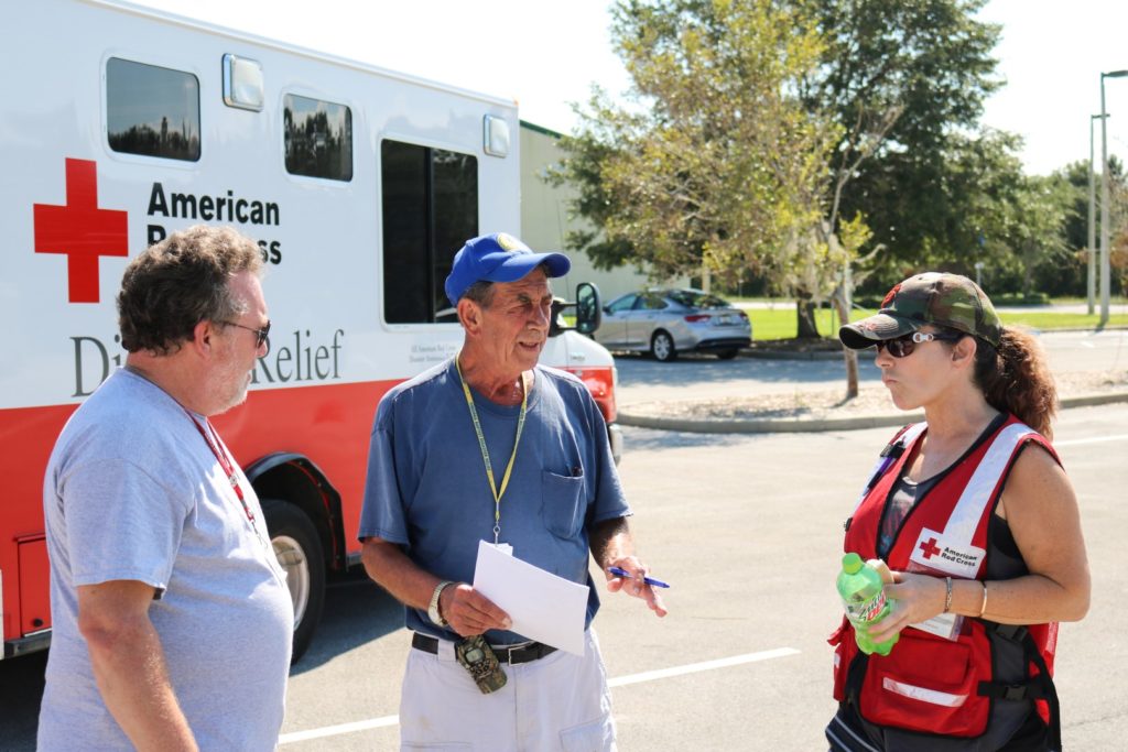 team leader works with american red cross partners